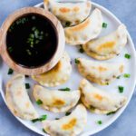 Read more about the article Baked Sticky Tempeh Potstickers